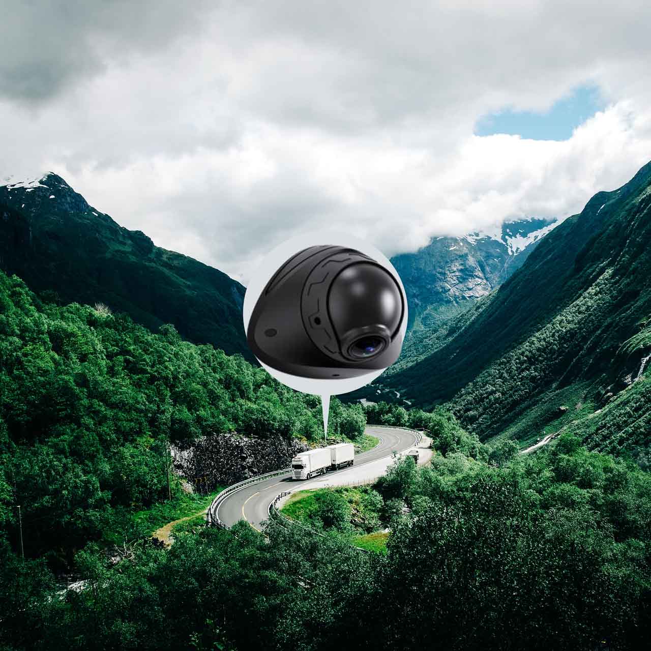 Dashcam view of a mountain road from the driver's perspective