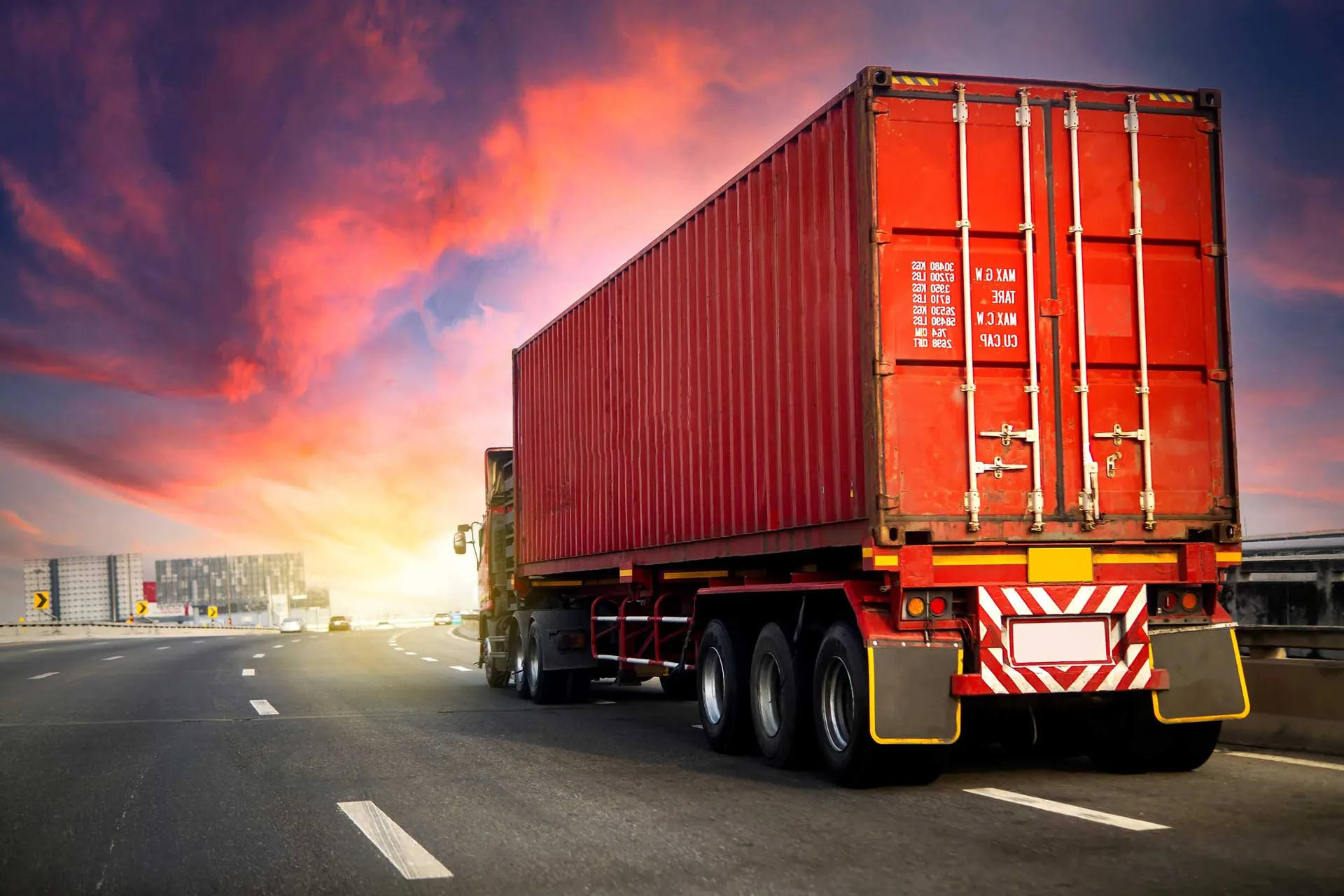 Container truck at sunset