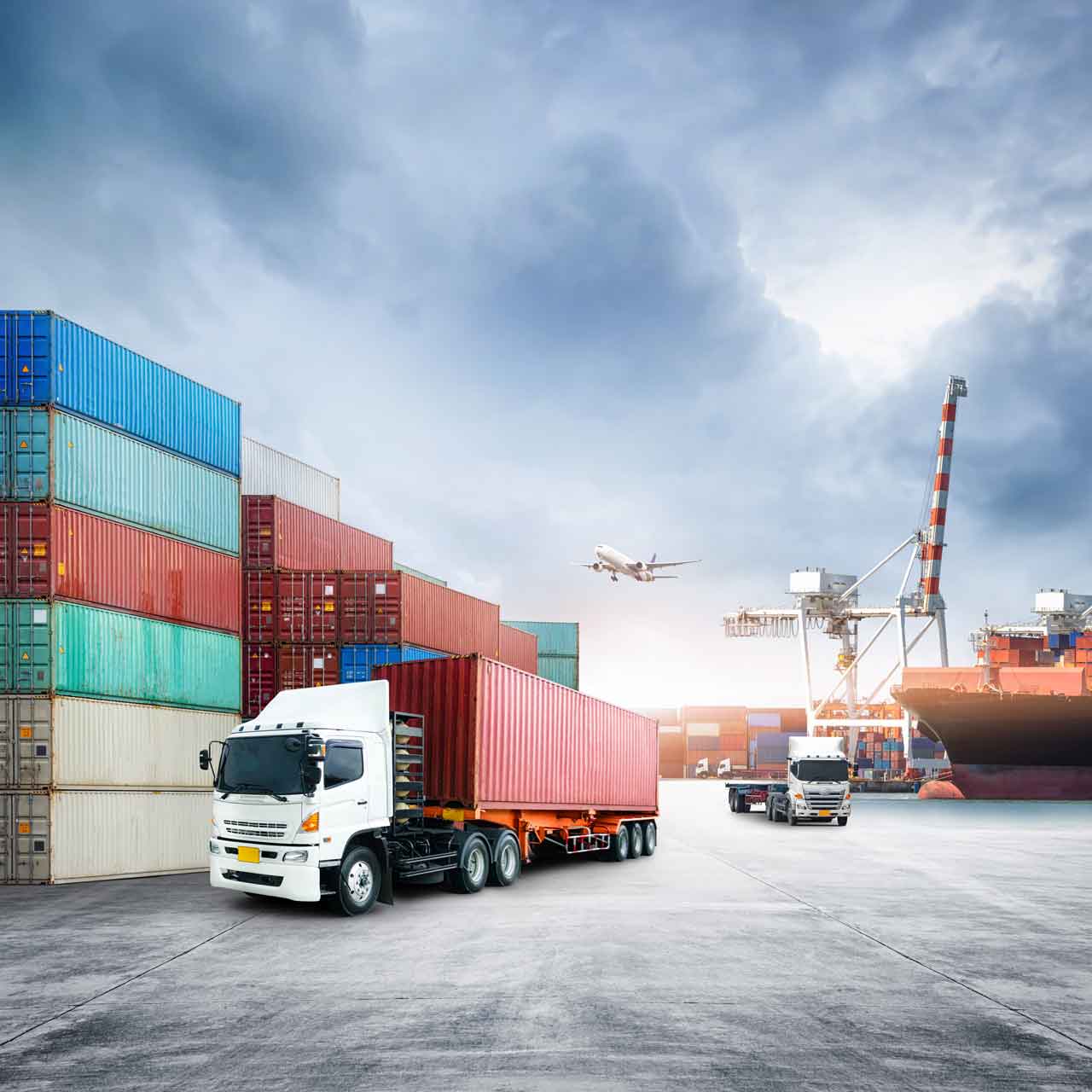 Containers and cranes at a logistics port
